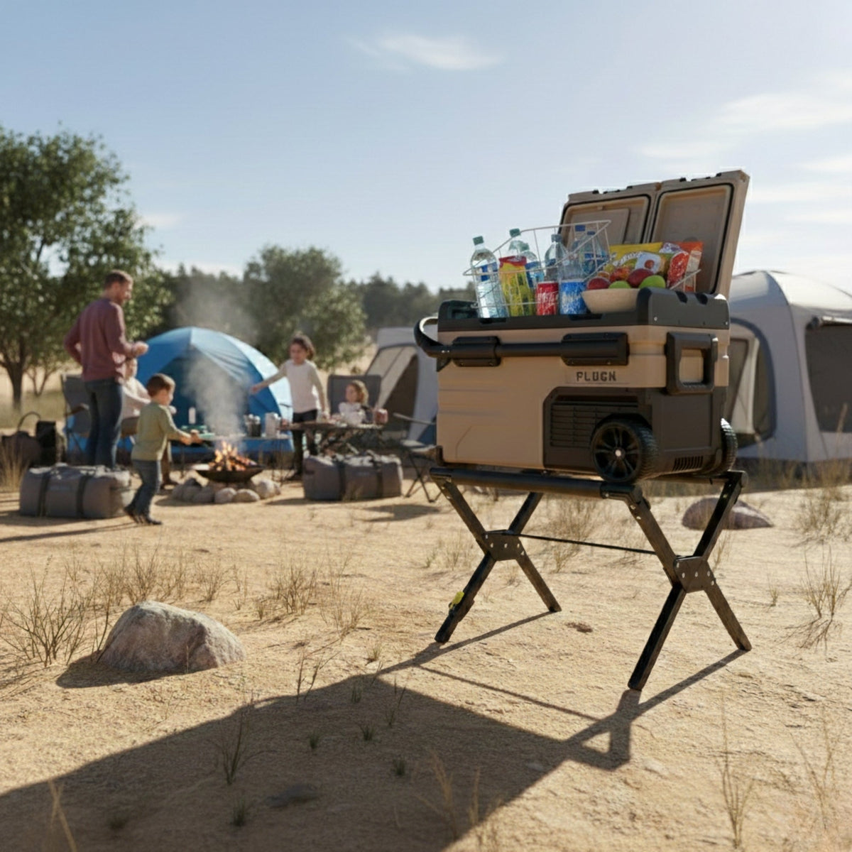 Family camping with FLUGN portable fridge on stand filled with snacks and cold drinks at outdoor campsite